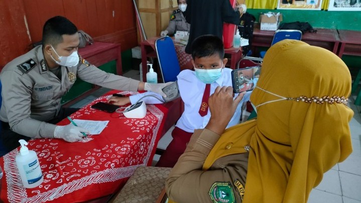 Vaksinasi di SD Negeri 7 Selatpanjang Baru Setengah dari Jumlah Murid