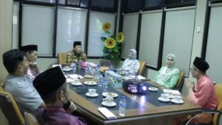 Bahas Tata Kelola Perpustakaan, Bupati Rohul Kunjungi Dispersip Riau