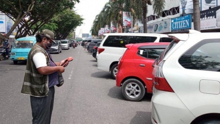 Dishub Pekanbaru Mengaku Banyak Masyarakat Ingin Jadi Jukir Dishub Pekanbaru Mengaku Banyak Masyarakat Ingin Jadi Jukir